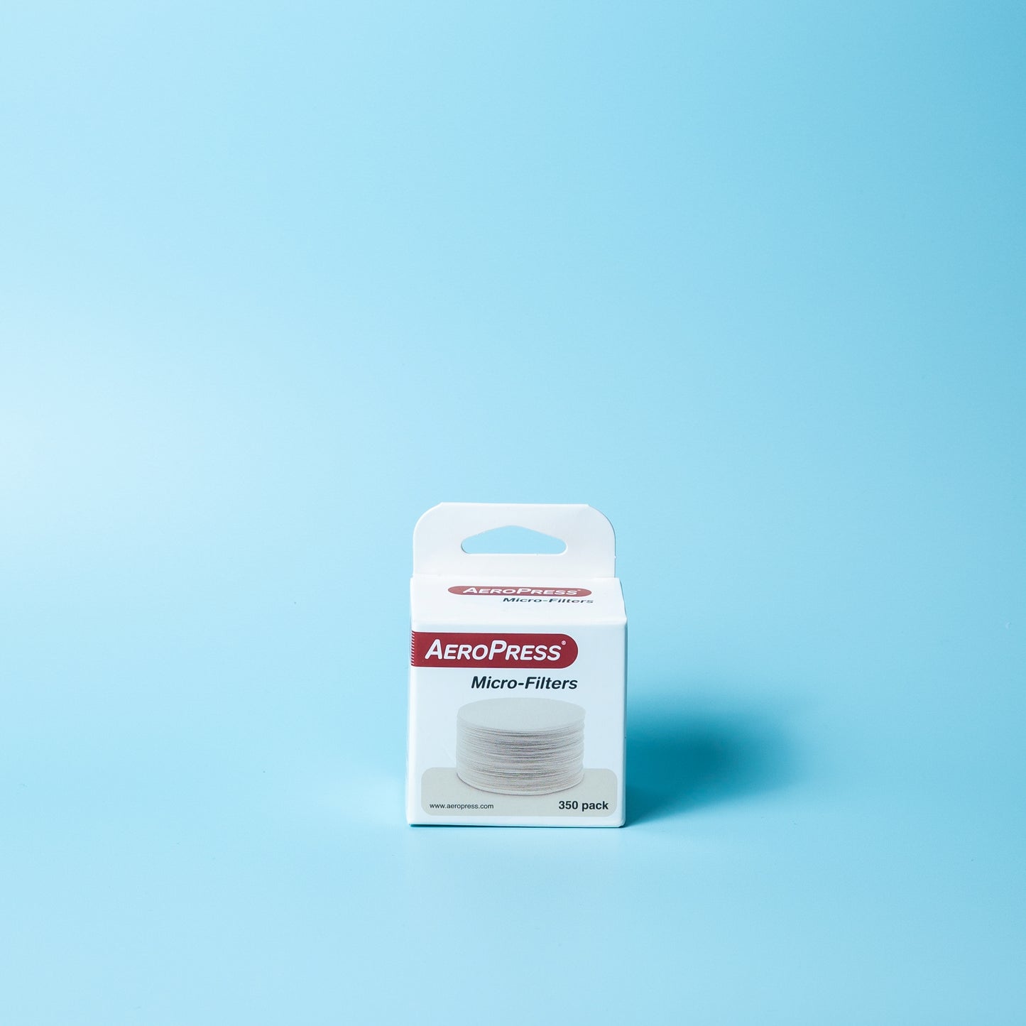 Close-up of round AeroPress paper coffee filters 350 pack
