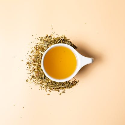 Infused cup of loose leaf lemon ginger tea. 